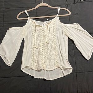 White, opened shoulder, half sleeved shirt